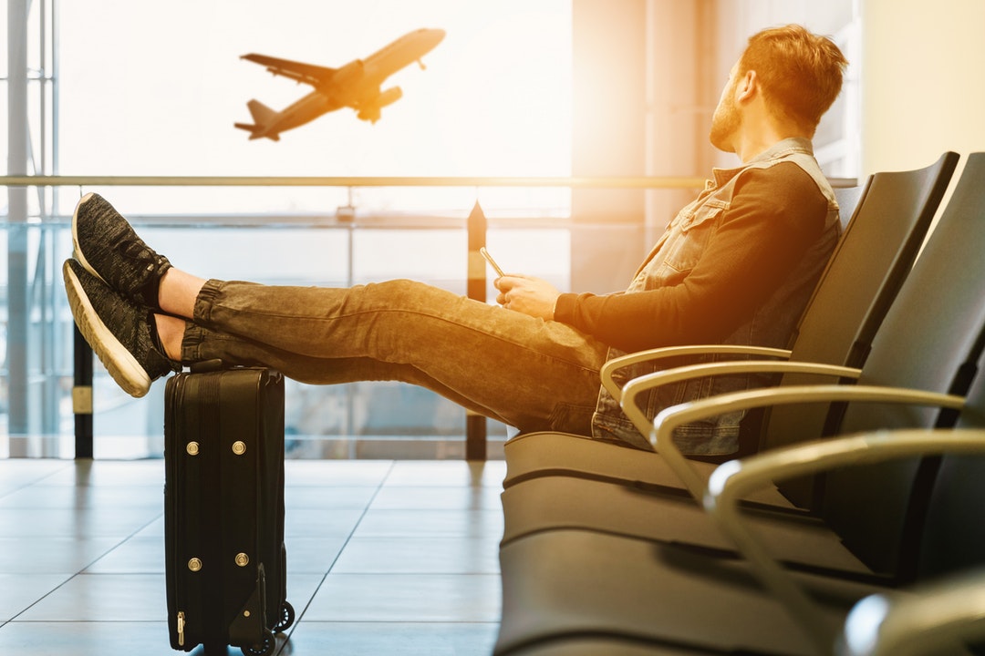 man waiting in airport