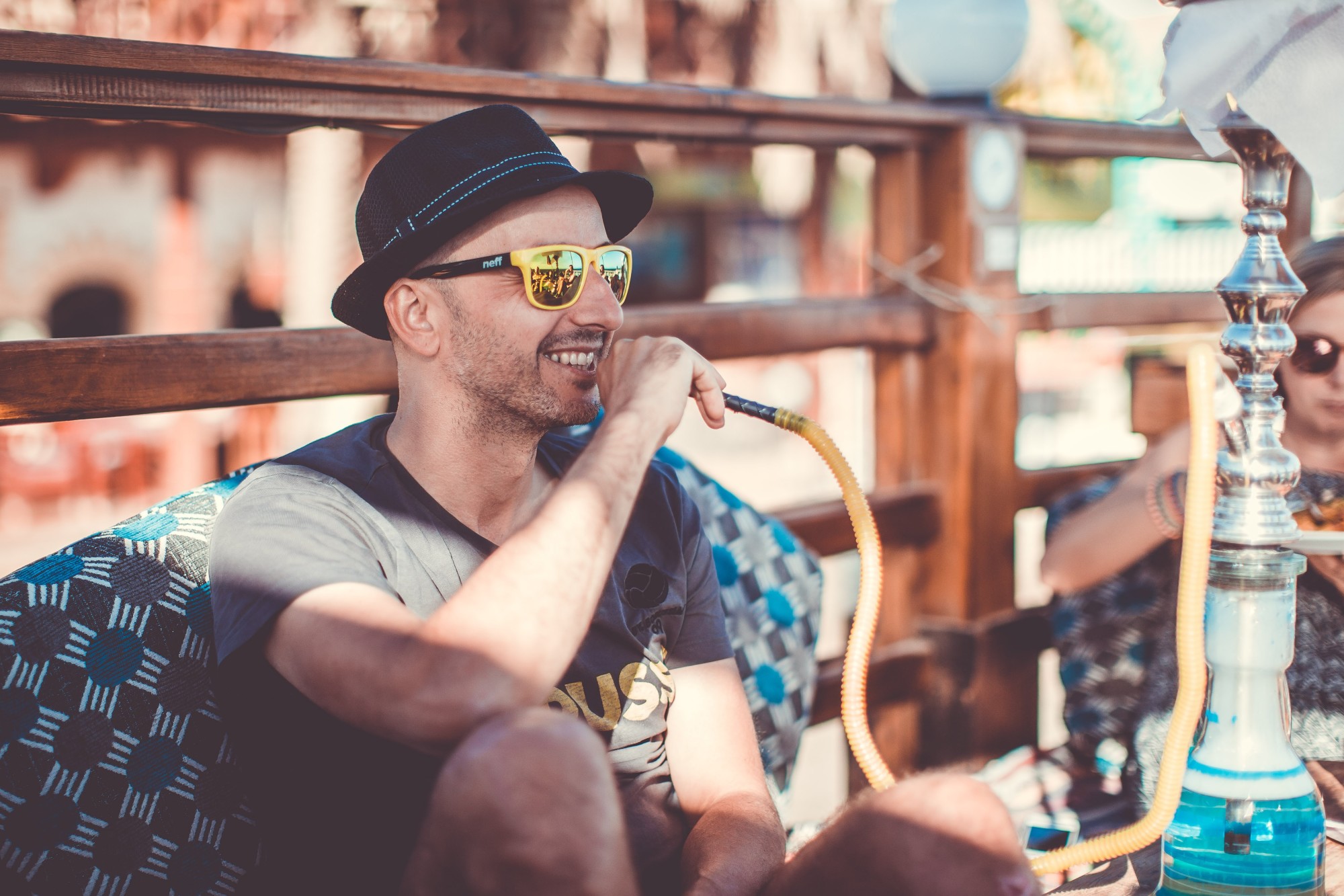 Man Smoking a Hookah